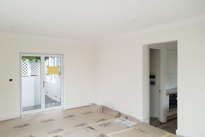 Freshly painted living room with French doors