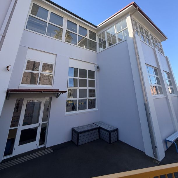 Painted rear elevation and classroom windows, primary school, Eastern Suburbs